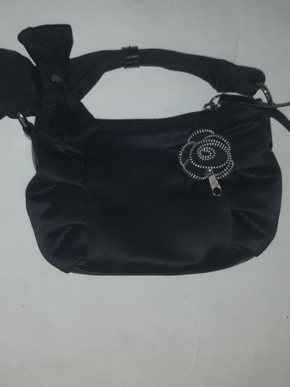 CANDIES BLACK CLUTCH WITH ZIPPER ROSE ON FRONT, ZIPPER CLOSURE & POCKET #73277